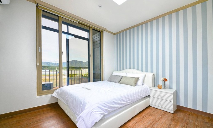 Tarimok House | Relax at Suncheonman Ddel Pension with Pool & Family Amenities