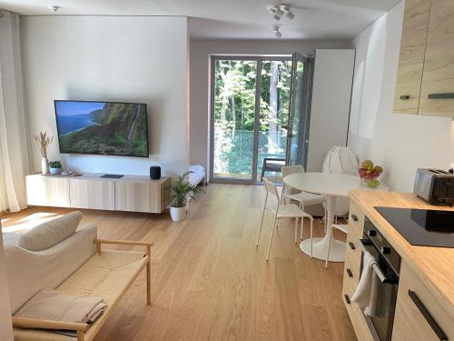 Juodkrante Apartment | Inviting Apartment with Forest View & Oceanfront Access