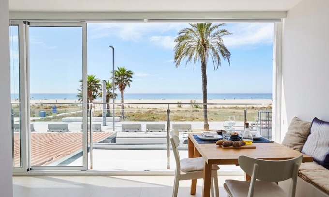 Castelldefels Apartment | Inviting Beachfront Getaway with Ocean Views for Families