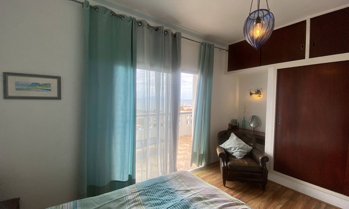 Valle Gran Rey Apartment | Sunny Harbor Apartment: Oceanfront Stay with Large Balcony