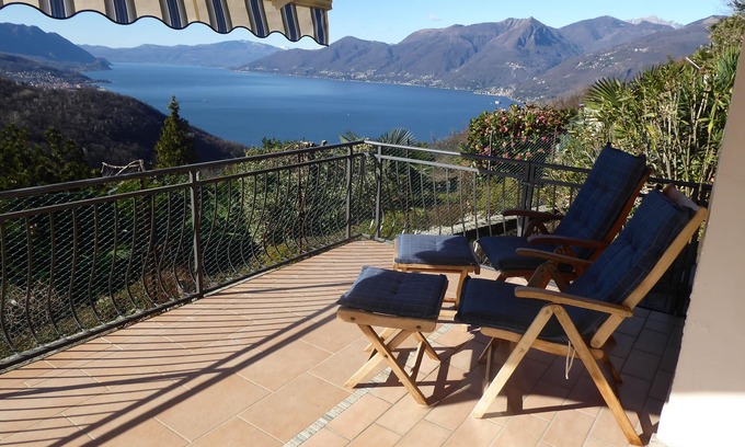 Dumenza House | Serene Vacation Apartment with Ocean View & Spa Amenities
