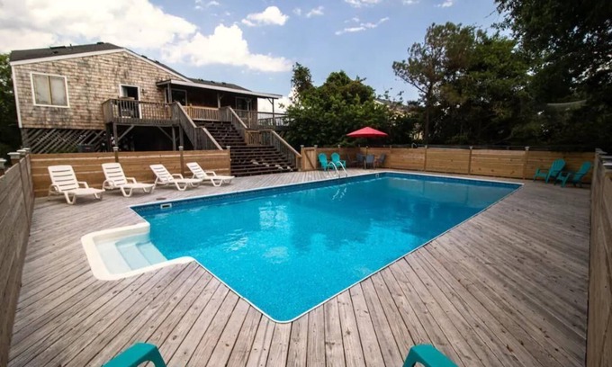 Sea Scape Cottage | Sunny Oceanfront Retreat with Golf and Family Amenities