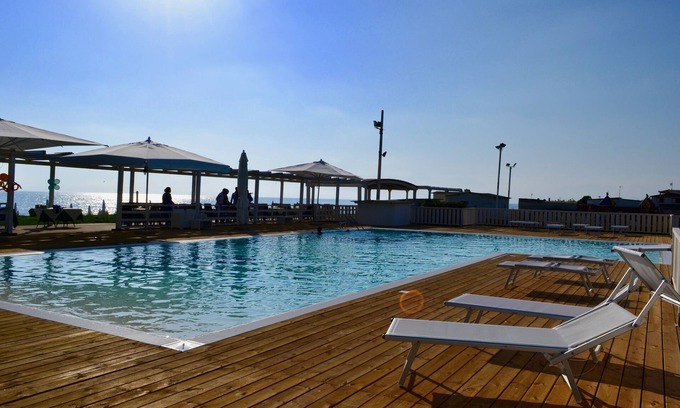Magazzeno Hotel | Accessible Sunrise Resort with Pool & Family-Friendly Amenities