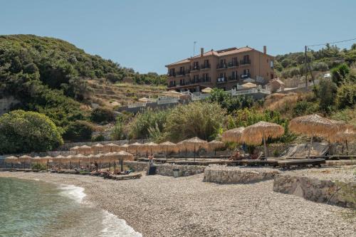 Kokkari Hotel | Beautiful Sunrise: Oceanfront Bliss with Private Beach Access