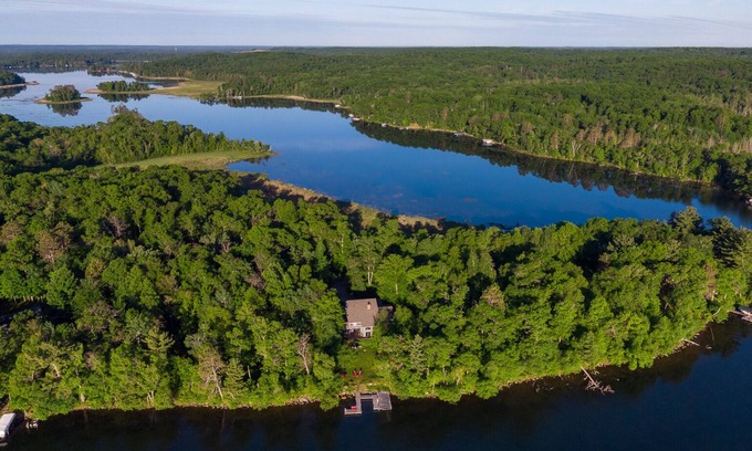 Pillager House | Tranquil Sunrise on Lake Sylvan with Spa and Ocean Views