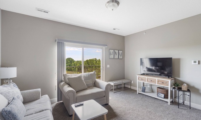 West Des Moines Apartment | Pet-Friendly Sunrise Serenity with Balcony & Pool Access