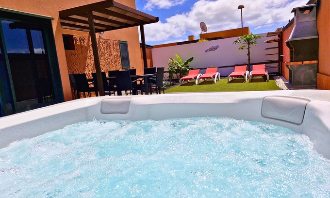 Corralejo Villa | Relax at Sunrise Surf House with Hot Tub & Garden Oasis