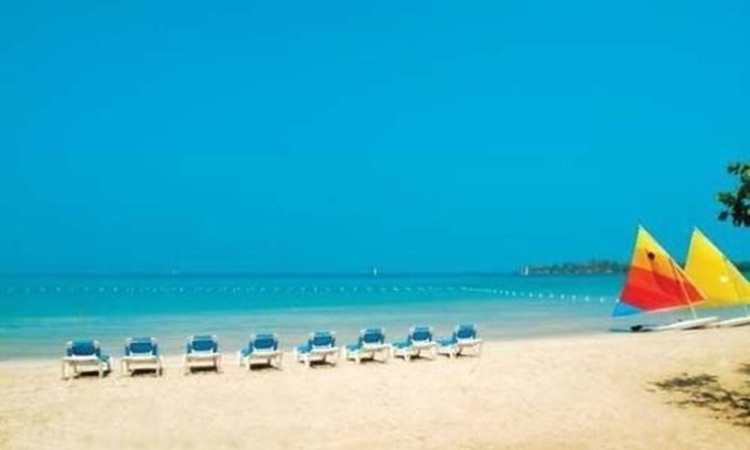 Orange Bay Resort | Adults-Only Paradise: Sunset at the Palms Resort Awaits