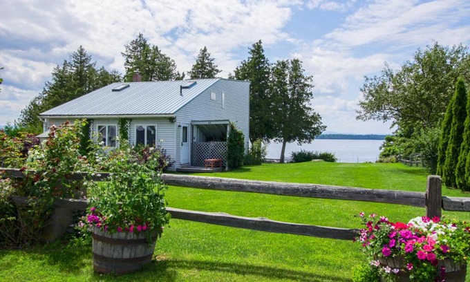 South Hero House | Oceanfront Escape at Sunset Beach with Private Amenities