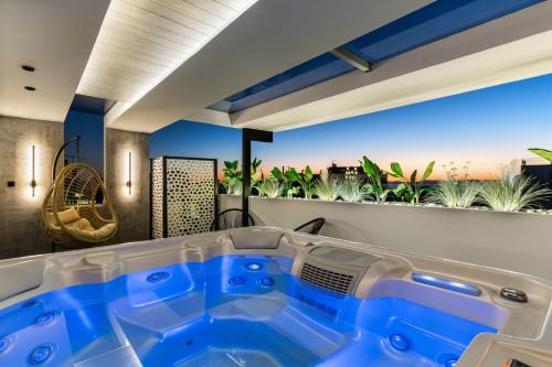 Argyroupoli Apartment | Relax at Sunset Escape & Spa with Inviting Hot Tub