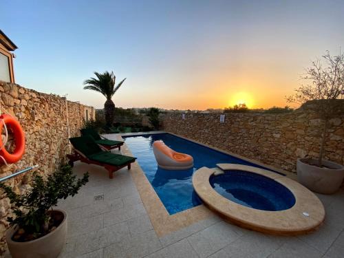 Gharb Villa | Experience Sunset Farmhouse: Pet-Friendly with Ocean Views