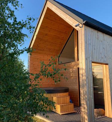 gmina Liniewo House | Charming Sunset Kaszuby: Pet-Friendly with Hot Tub & Kitchen