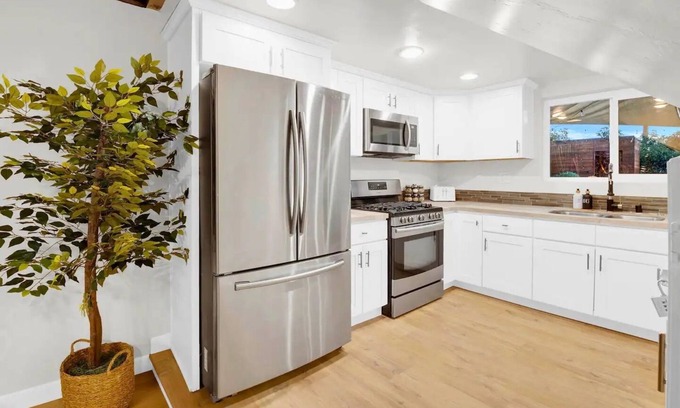 College East House | Discover Sunset Paradise: Heated Pool, Hot Tub & Ocean Views