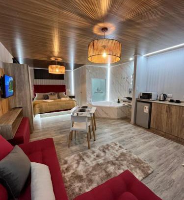 Almafuerte Apartment | Relax at Sunset Paradise Suites with Breakfast & Hot Tub
