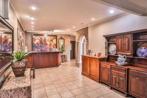 Rustenburg House | Discover Sunset Ridge Guest House with Pool & Breakfast