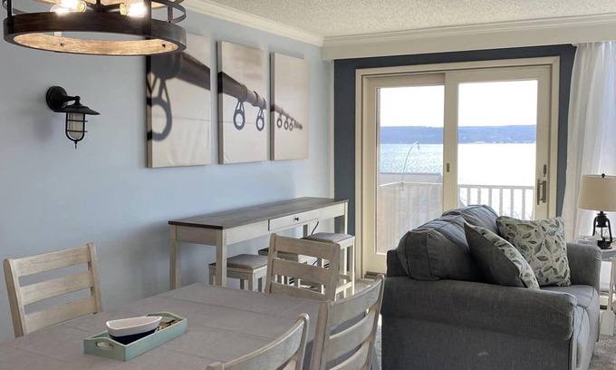 Dewittville Condo | Family-Friendly Sunset Shores Condo with Pool & Private Deck