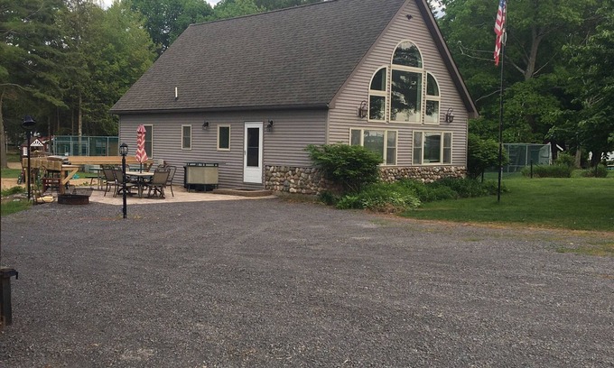 Pulaski House | Pet-Friendly Sunset Vacation Rentals with Lake Views