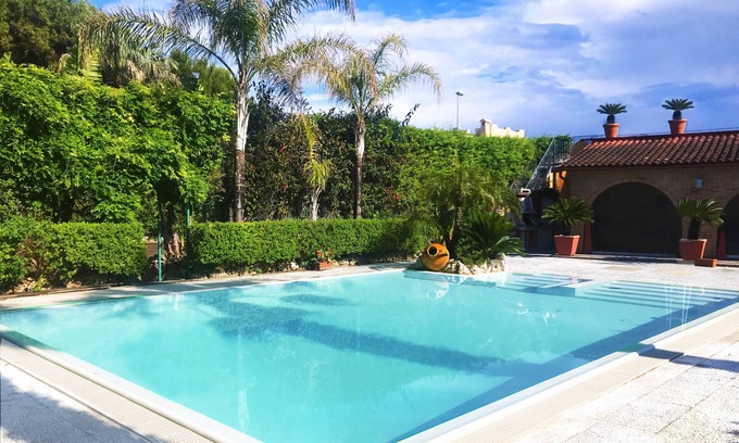 Taranto House | Relax at Sunset View Loft with Pool & Oceanfront Bliss