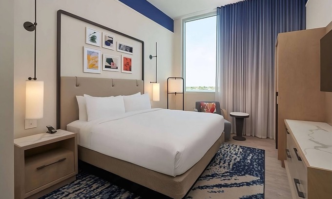 Ojus Hotel | Relax at Our Beachfront Oasis with Rooftop Pool & Kitchenette