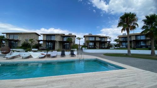Kallithea Villa | Idyllic Sunshine Villa: Oceanfront Getaway in Kallithea