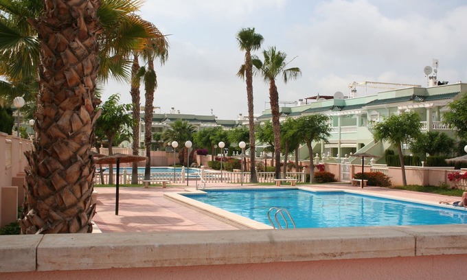 Puerto Marino Apartment | Inviting Apartment with Roof Garden and Pool Access