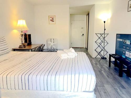 Spring Valley House | Cozy Bedroom with Private Bathroom for a Relaxing Stay