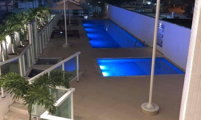 Praia Grande Apartment | Ideal Getaway with Pool and Kitchen Near Grand Praia
