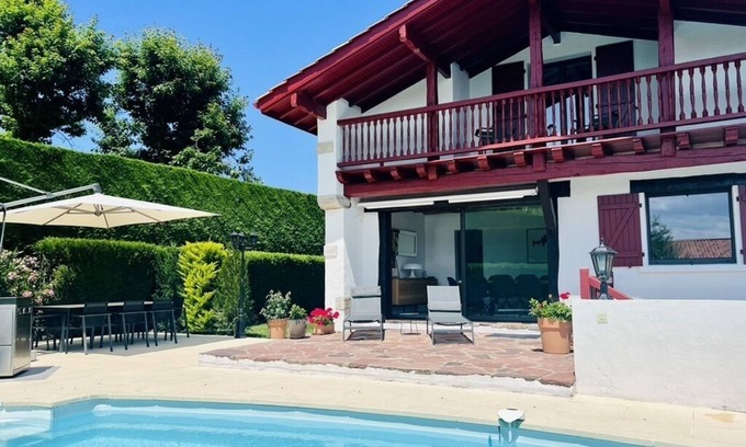 Behobie House | Elegant Villa with Pool, Steps from the Ocean