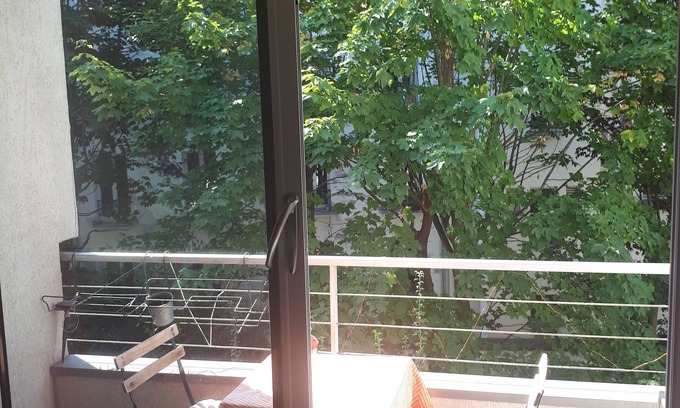 Quartier de la Goutte-d'Or Apartment | Inviting Montmartre Apartment with Patio and Top Ratings