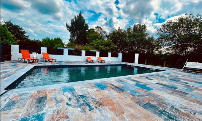 Aureilhan Villa | Inviting Heated Pool Villa Steps from Ocean Lake