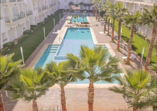 Bouznika Apartment | Beachfront Retreat: 4-Star Residence with Pool & High Ratings