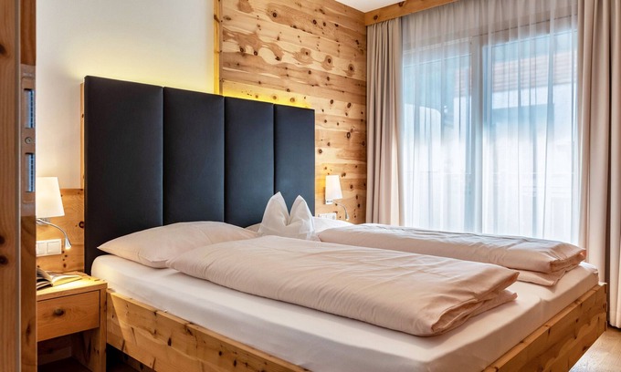 Gudon Apartment | Top-Rated Marialisa Apt Orchidee with Mountain View & Hot Tub