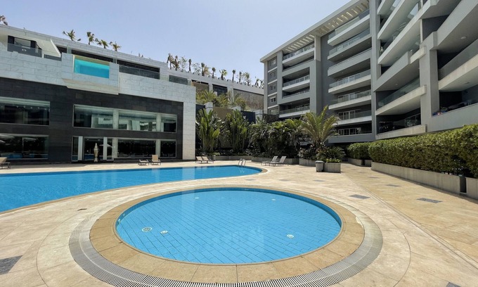 Heliopolis Apartment | Convenient Studio King Near Airport with Pool & Breakfast