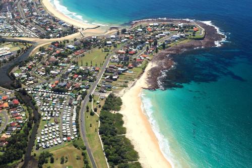 Barrack Point Resort | Oceanfront Comfort at Surfrider Caravan Park, Rated 8/10