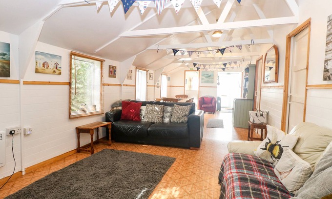 Bacton Cottage | Pet-Friendly Suzanne's Beach Hut with Oceanfront Views