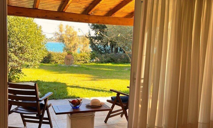 Gouvia Apartment | SV Apartment: Oceanfront Escape with Private Sea Views
