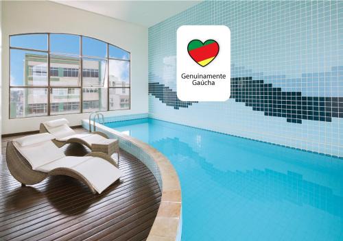 Exposicao Hotel | Discover Swan Caxias do Sul: Pet-Friendly & Pool Access