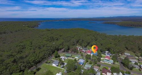 Sussex Inlet House | Relaxing Swan Lake Escape: Family-Friendly 4-Star Retreat