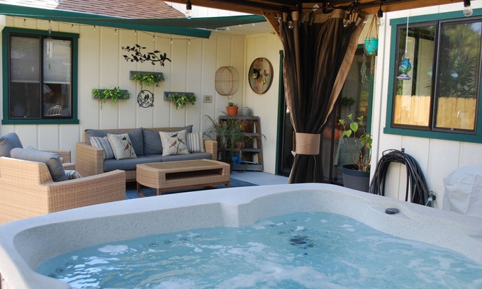 Redding House | Inviting Bird Themed Nest with Hot Tub & Ocean View
