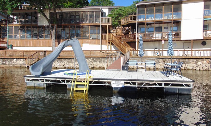 Lake Ozark Condo | Family Fun Awaits at Swim Dock: Lake View & Spa Access