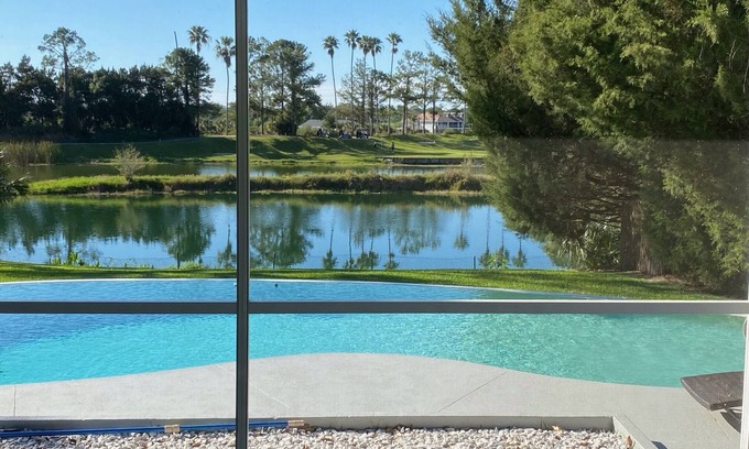 Groveland House | Experience SWISS 28 - Lake Stephanie: Pet-Friendly Retreat