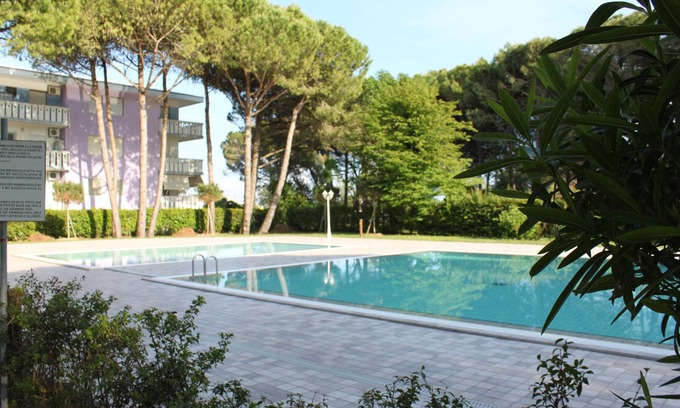 Bibione Lido del Sole Apartment | Inviting Apartment with Pool and Oceanfront Views