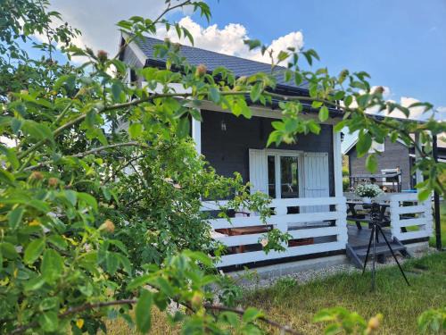 gmina Piotrkow Kujawski House | Relax at Szary Domek: Jacuzzi, Lake Views & Pet Friendly