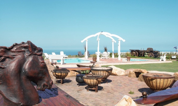 Plettenberg Bay Bed & Breakfast | Relax at T'Niqua Stable Inn: Ocean Views & Guest Rated 9.8