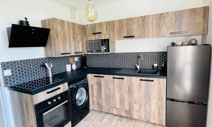 Limoges Apartment | Modern Retreat in Limoges Bords de Vienne with Amenities