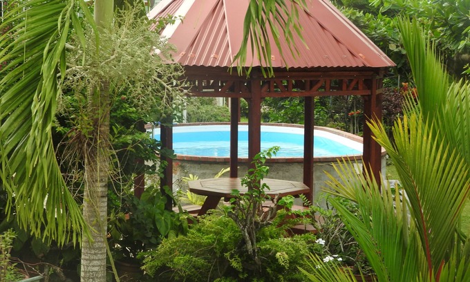 Tartane Apartment | Inviting Studio in Garden Setting with Ocean View & Pool