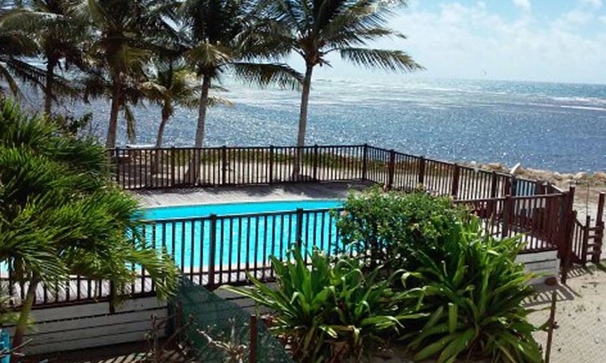 Sainte-Anne Apartment | Oceanfront Retreat with Pool & Spectacular Sea Views