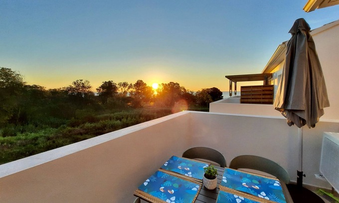 Bravone Apartment | Beautiful Sea View Getaway with Pool and Spa Amenities