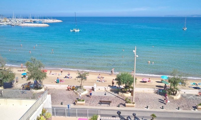Le Lavandou Apartment | Prime Location with Ocean Views and Pool Access