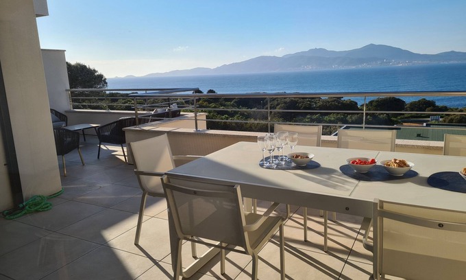 Pietrosella Apartment | Elevated Ocean View Retreat: T3 Neuf Design with 9.8 Rating